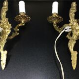 Paire d’appliques bronze 2 lumières style Louis XV