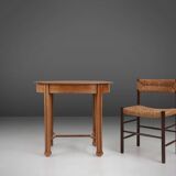 Timeless French Art Deco carved oval side table in oak, 1930s