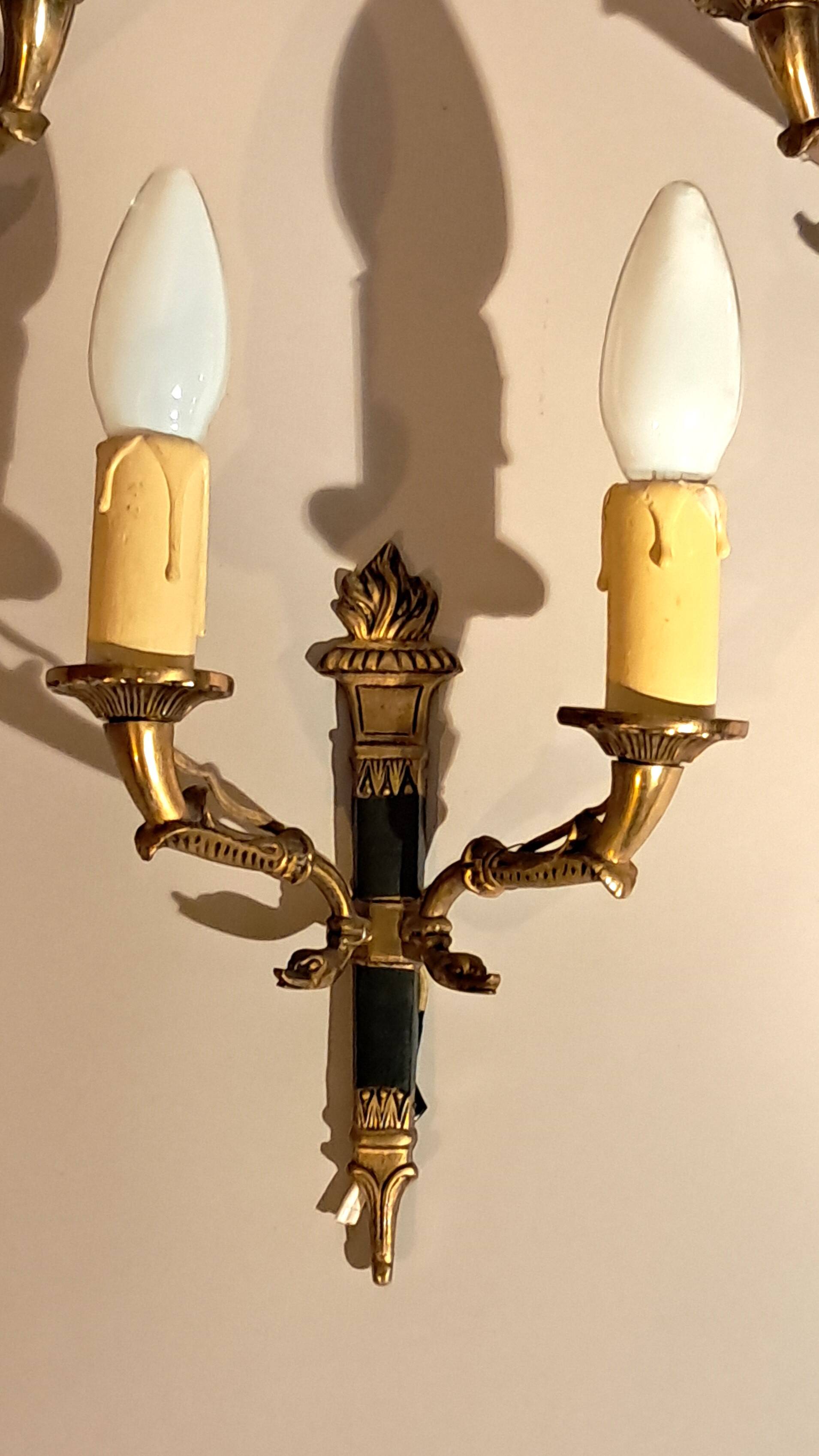 Set of 3 Empire style wall lights in bronze and gilded and green lacquered brass, Circa 1950.