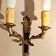 Set of 3 Empire style wall lights in bronze and gilded and green lacquered brass, Circa 1950.