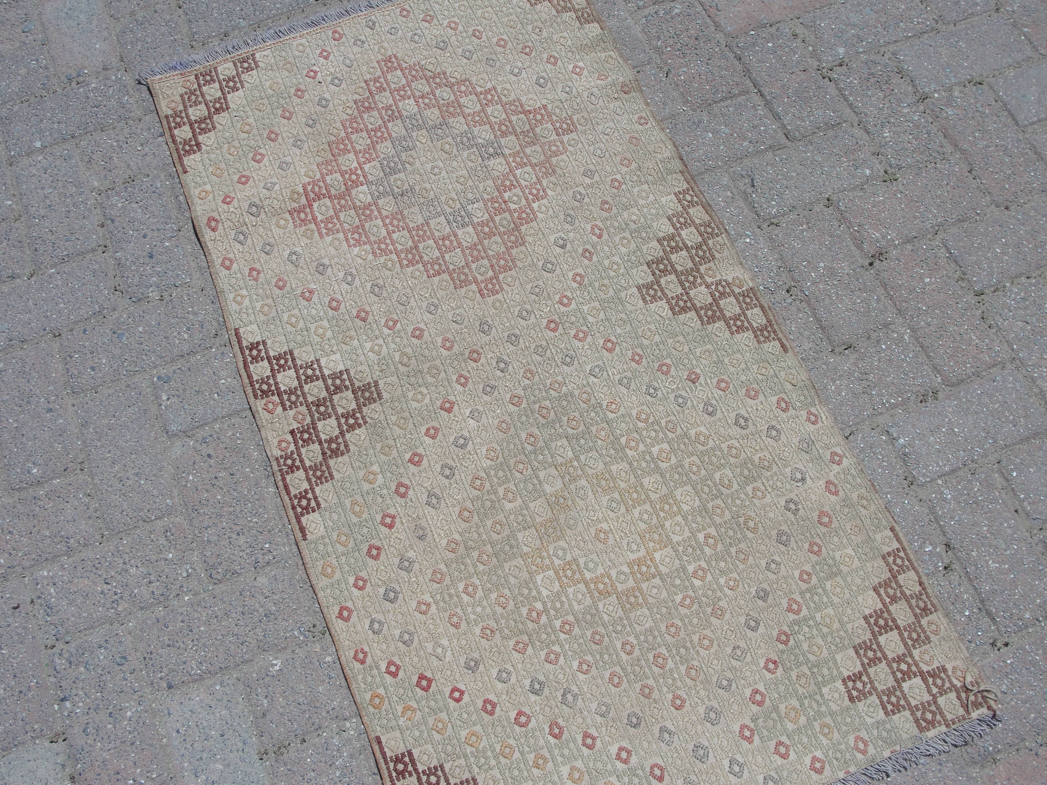 Handmade small kilim rug 64cm x 122cm