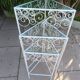 3 nesting tables in white wrought iron. Beveled glass.