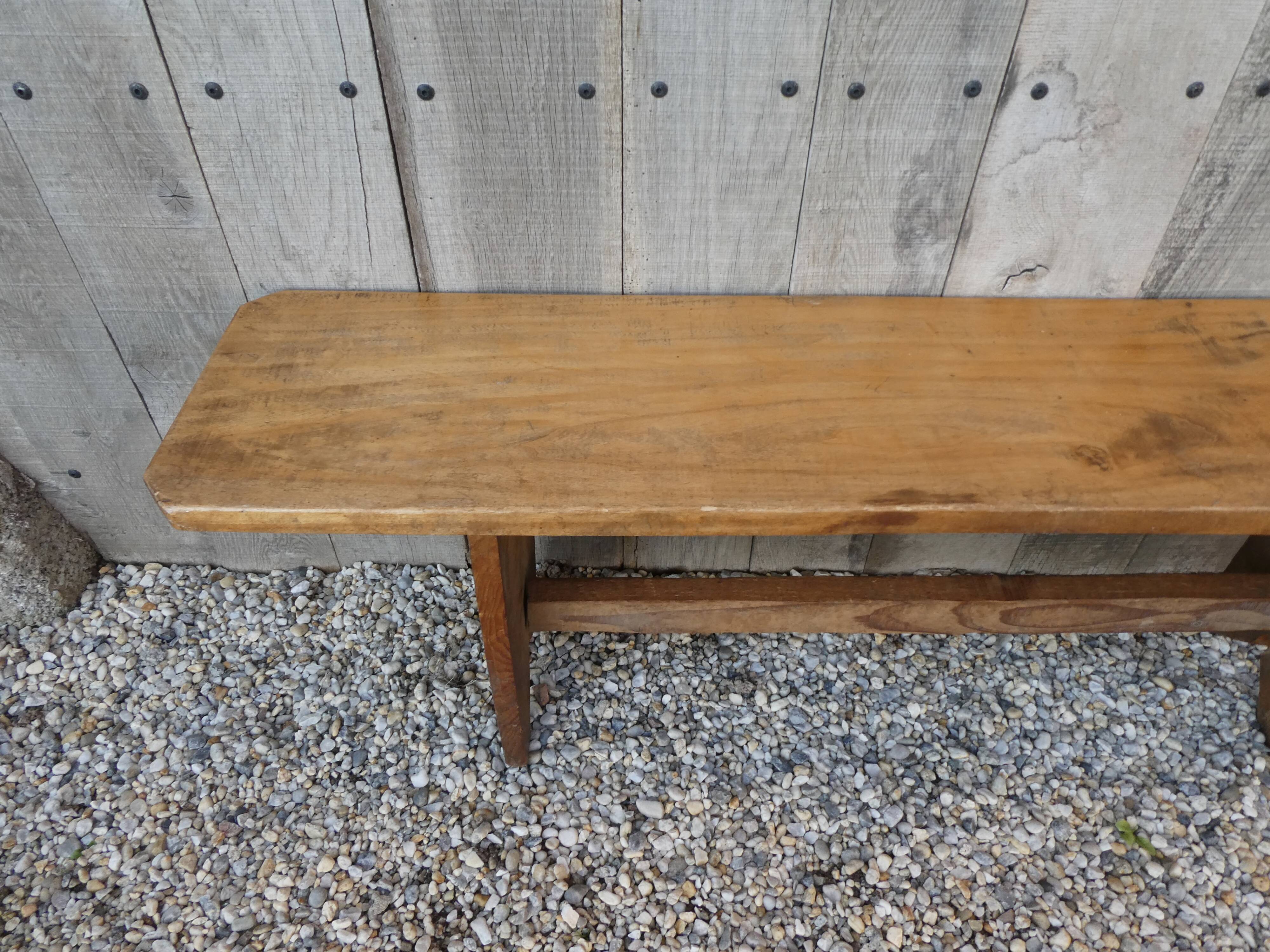 Wide solid wooden bench