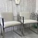 Pair of stainless steel armchairs from the 70s
