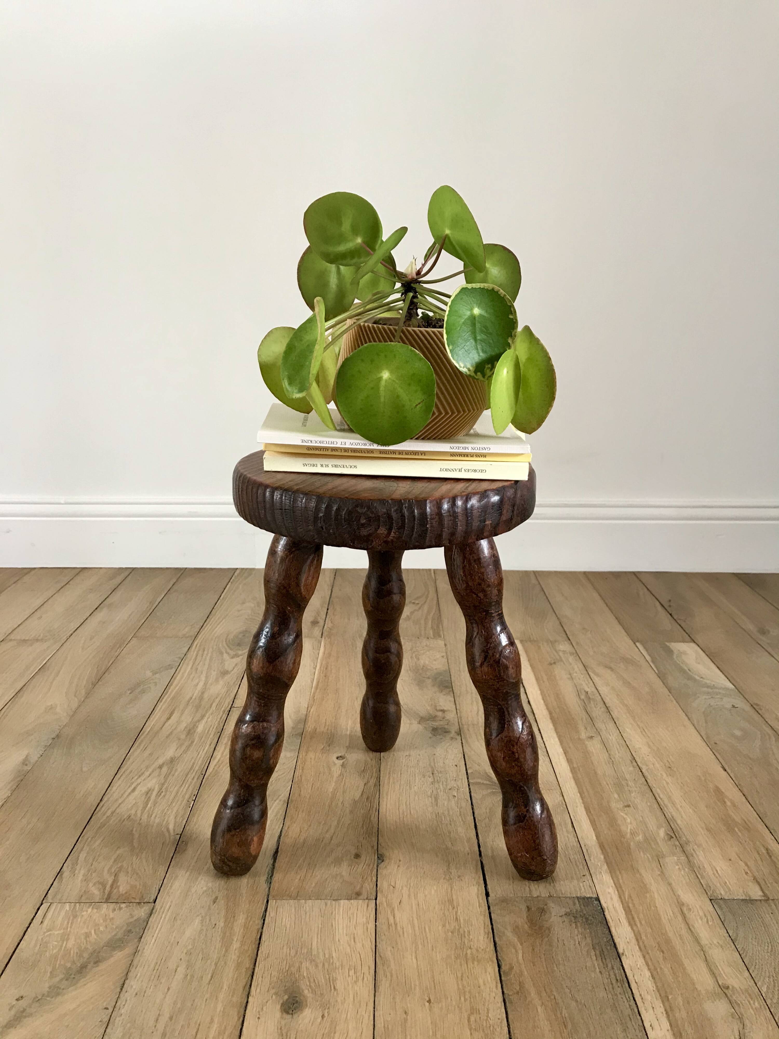low stool in solid turned wood from the 70s