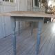 Vintage farm table, base and belt re-enchanted in verdigris, wooden top.