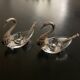 2 swan-shaped salt pots in metal and glass