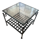Table basse avec plateau en verre et structure en métal noir