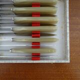 Lot 12 Art Deco style knives in case