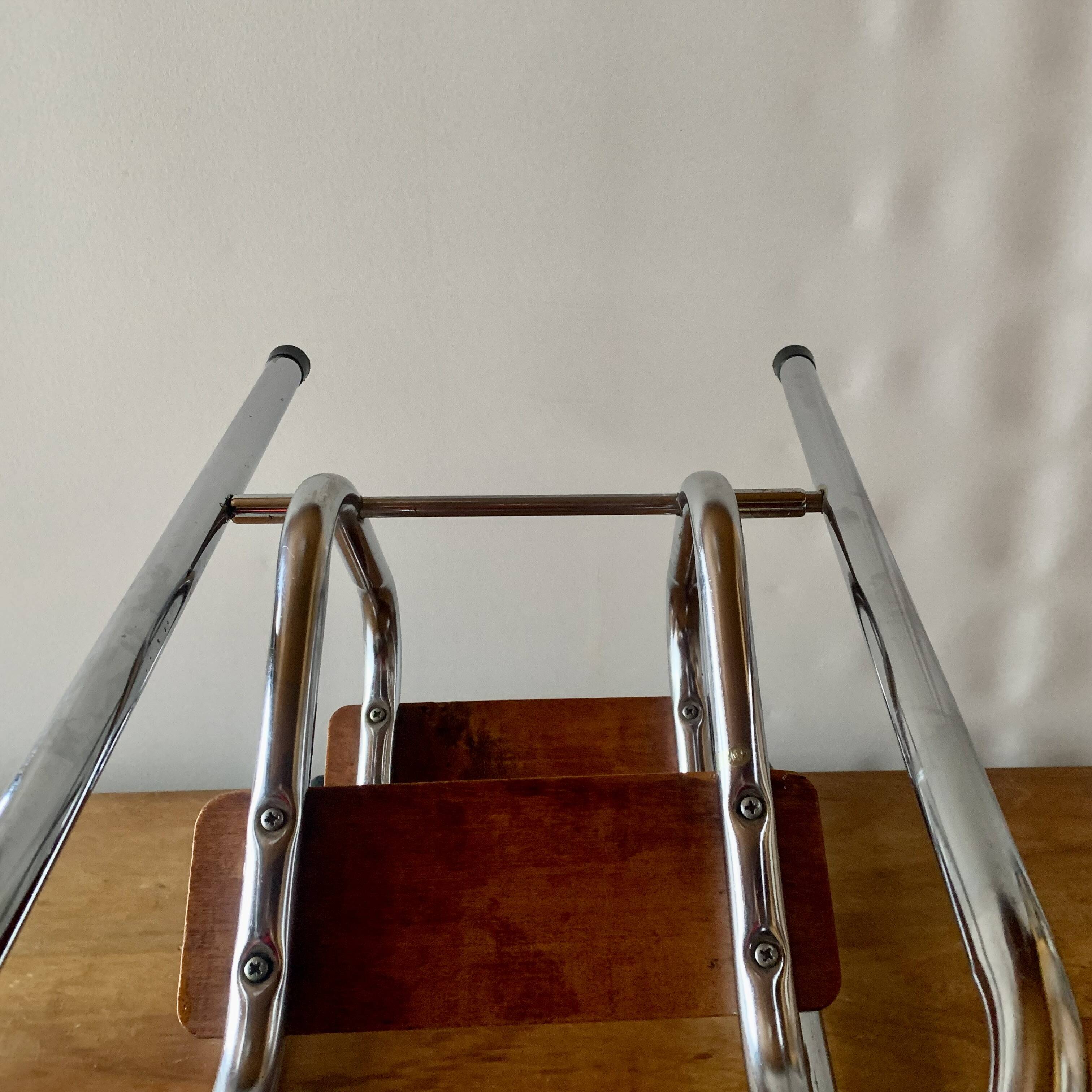 Vintage step stool in brown formica and chrome steel