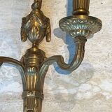 Set of 4 bronze wall lights in Louis XVI style.