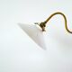 Swan neck wall light in smooth opaline and brass, early 20th century.