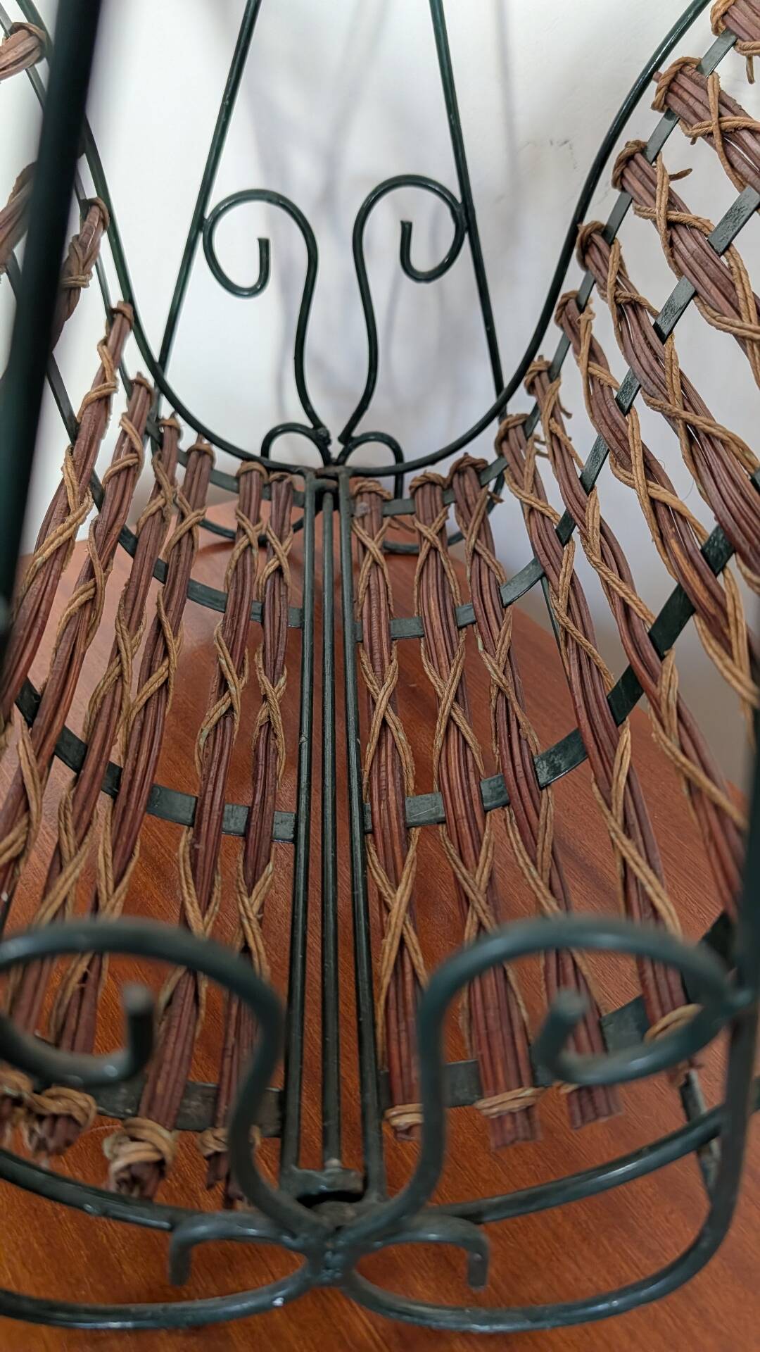 Metal and woven rattan magazine rack from the 60s.