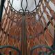 Metal and woven rattan magazine rack from the 60s.