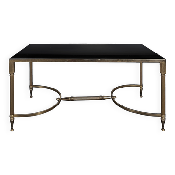 Neoclassical coffee table in brass and black glass from the 1960s.