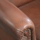 Comfortable cowhide wingback armchair in English style with a timeless look