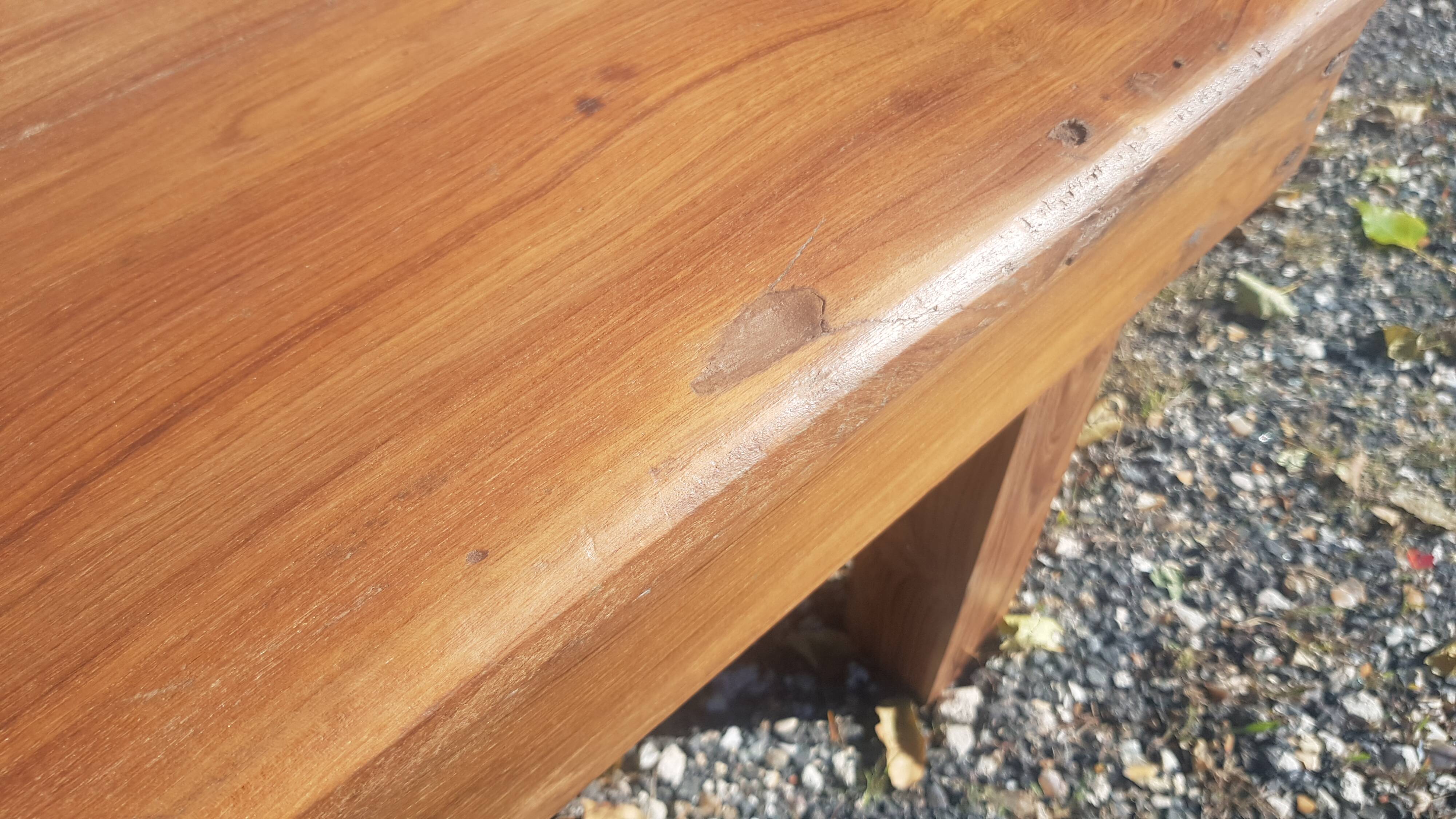 Old industrial workshop coffee table made of solid teak.