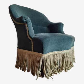 Green velvet toad armchair with fringes