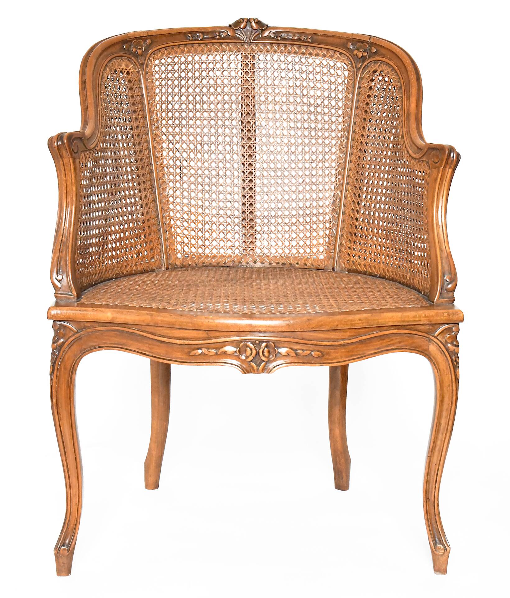 Louis XV style caned bergère armchair