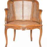 Louis XV style caned bergère armchair