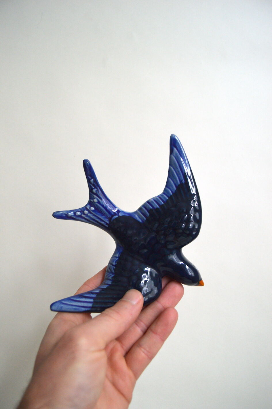 Couple of ceramic wall swallows