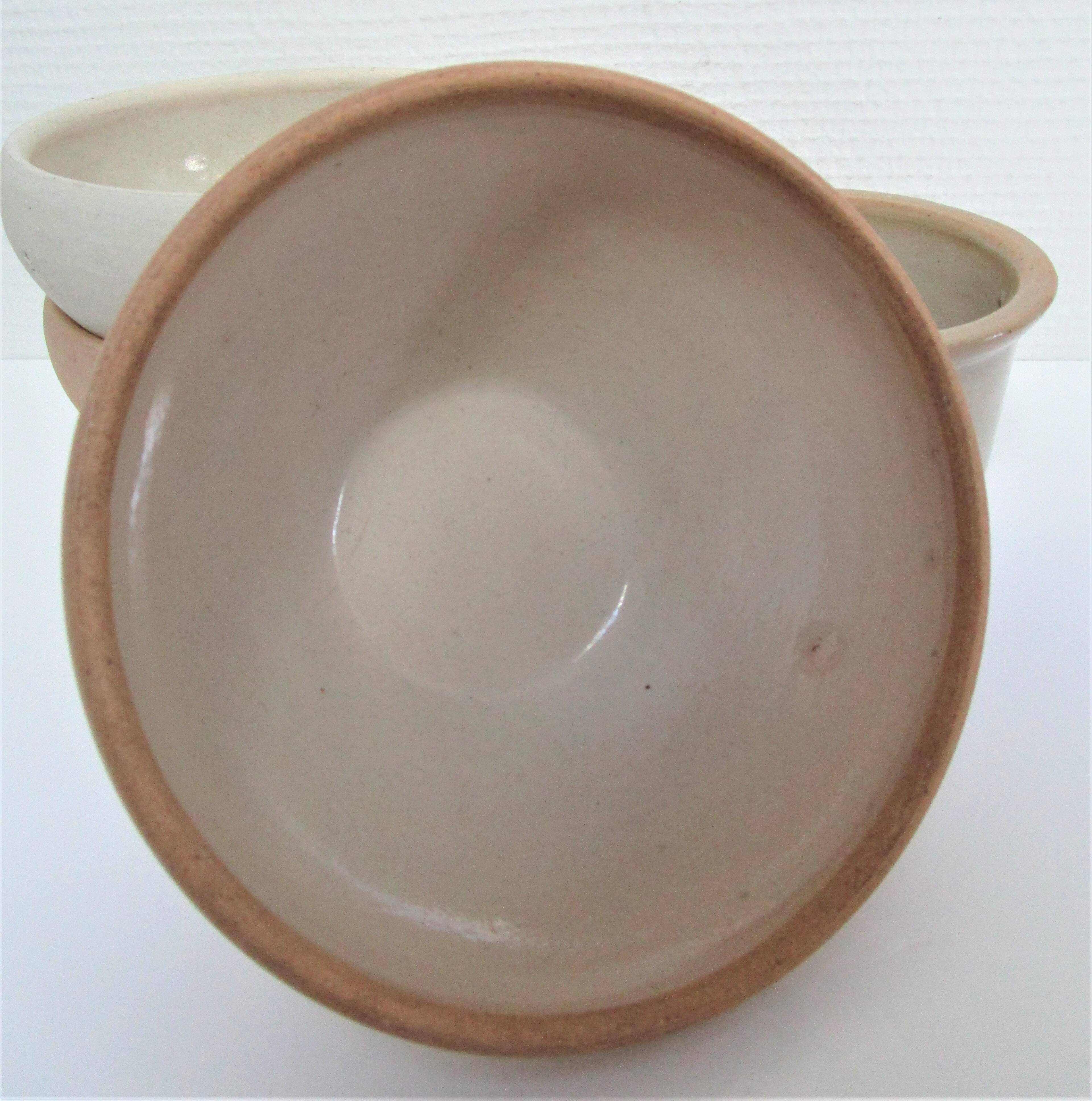 Three XL bowls and old stoneware dish