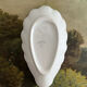 Small shell-shaped ramekin in antique Pillivuyt porcelain.