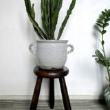 Dark wooden tripod stool