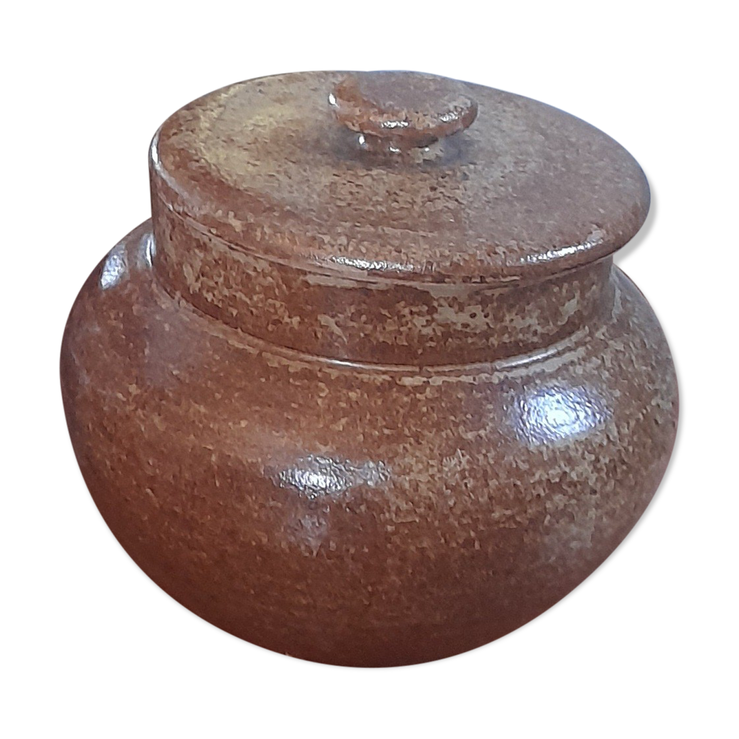 Old salt pot in sandstone, with lid