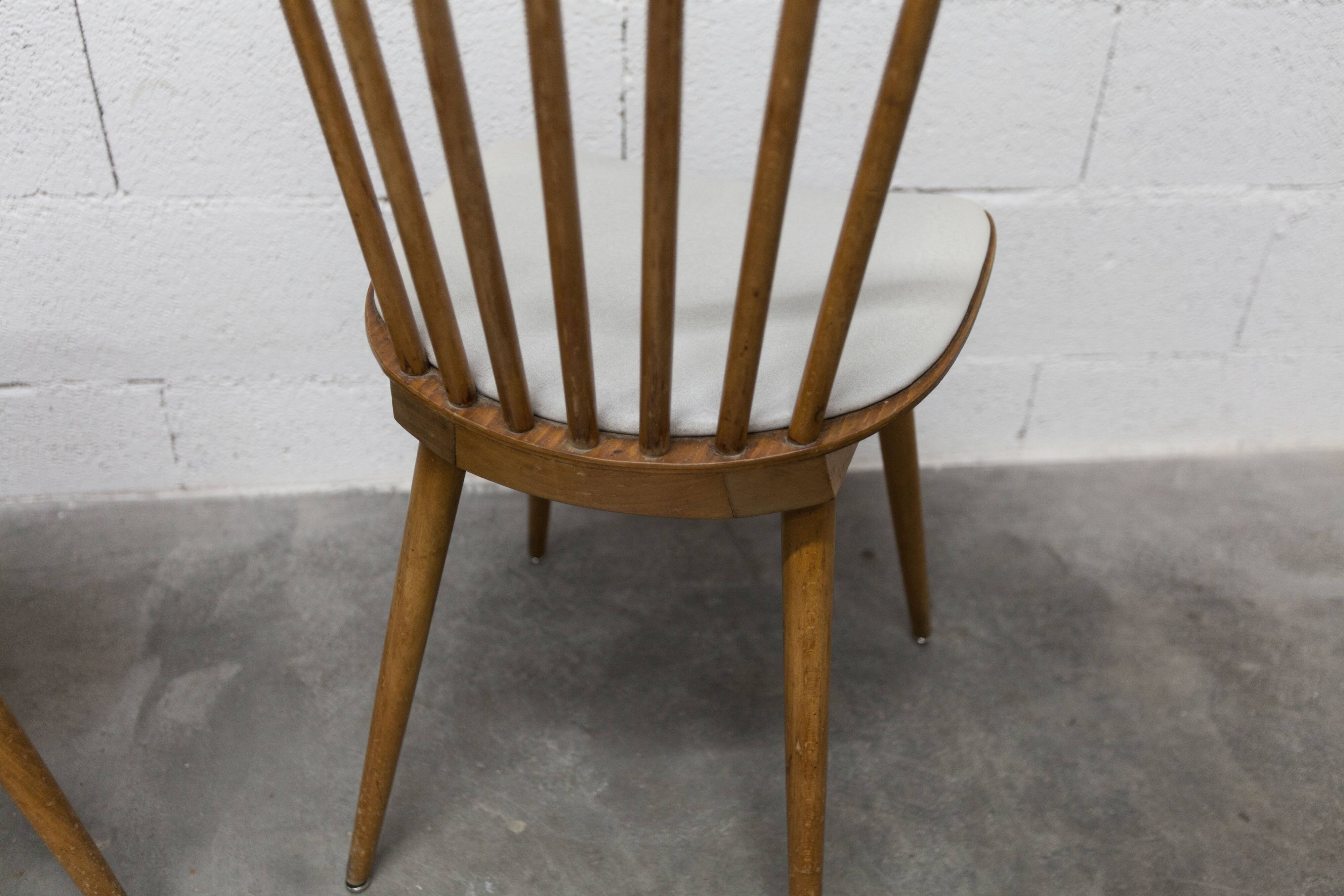 Pair of Baumann Menuet chairs, Honey patina, White vinyl seats