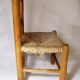 Old child chair in wood and straw