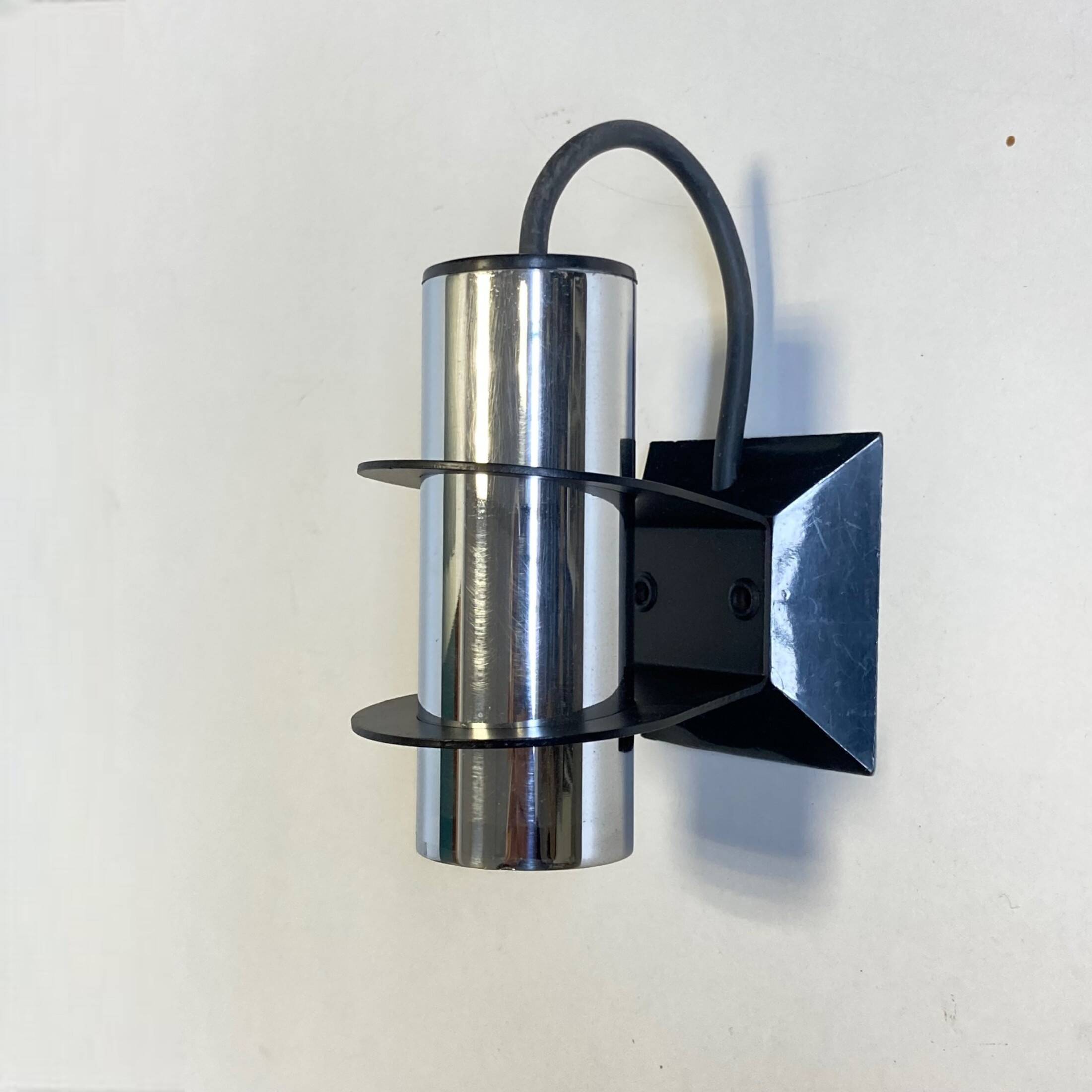 Pair of Targetti Sankey chrome wall lights. 1970s. Italy