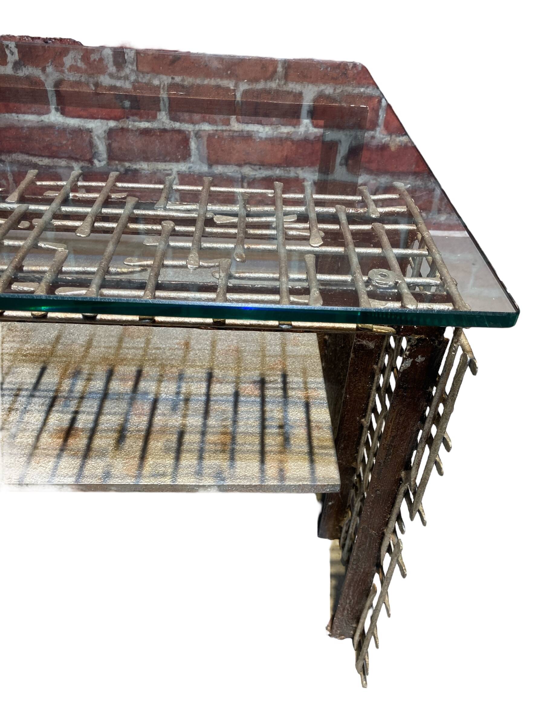 Metal coffee table with glass top