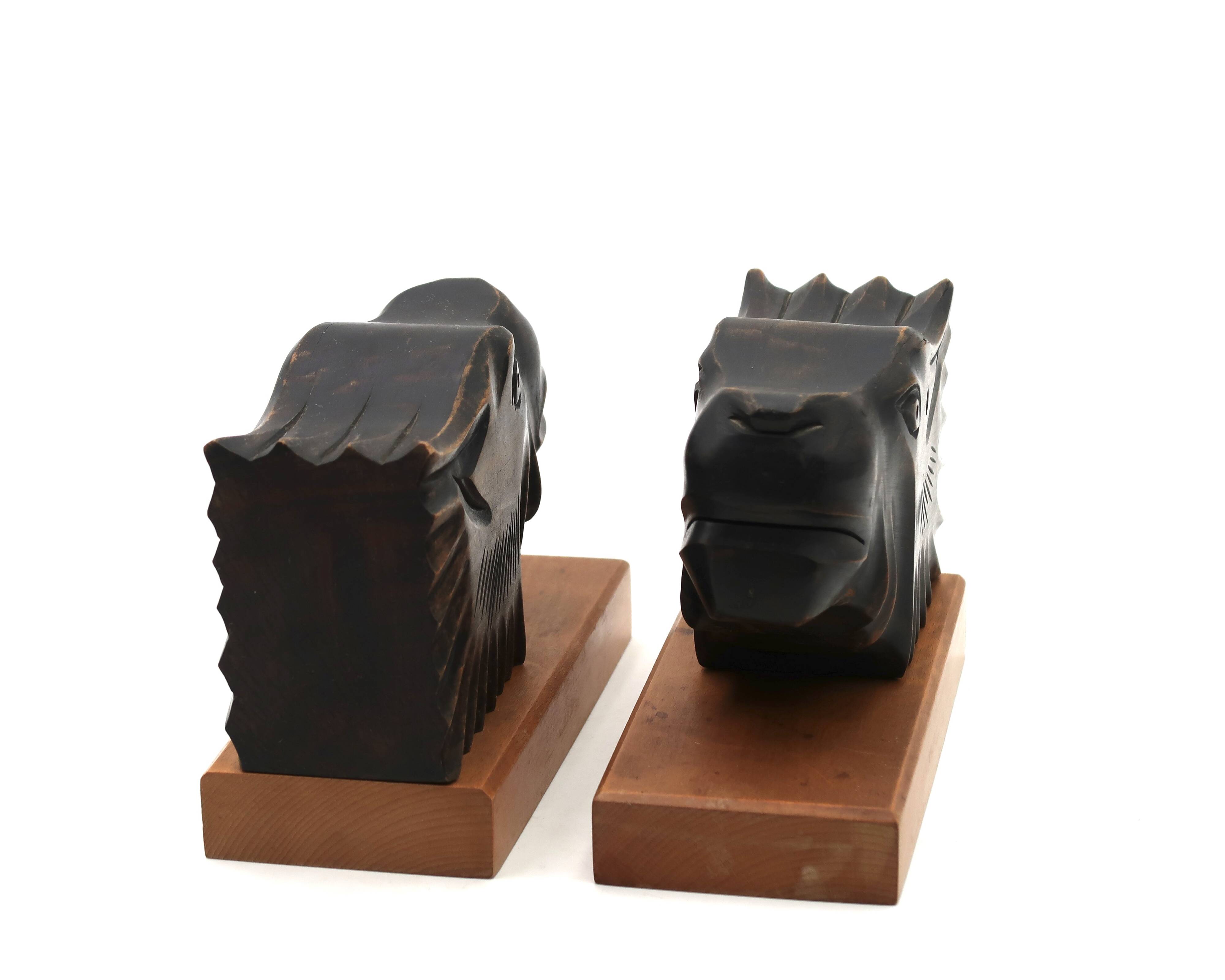 Art Deco wooden bookends with feline heads