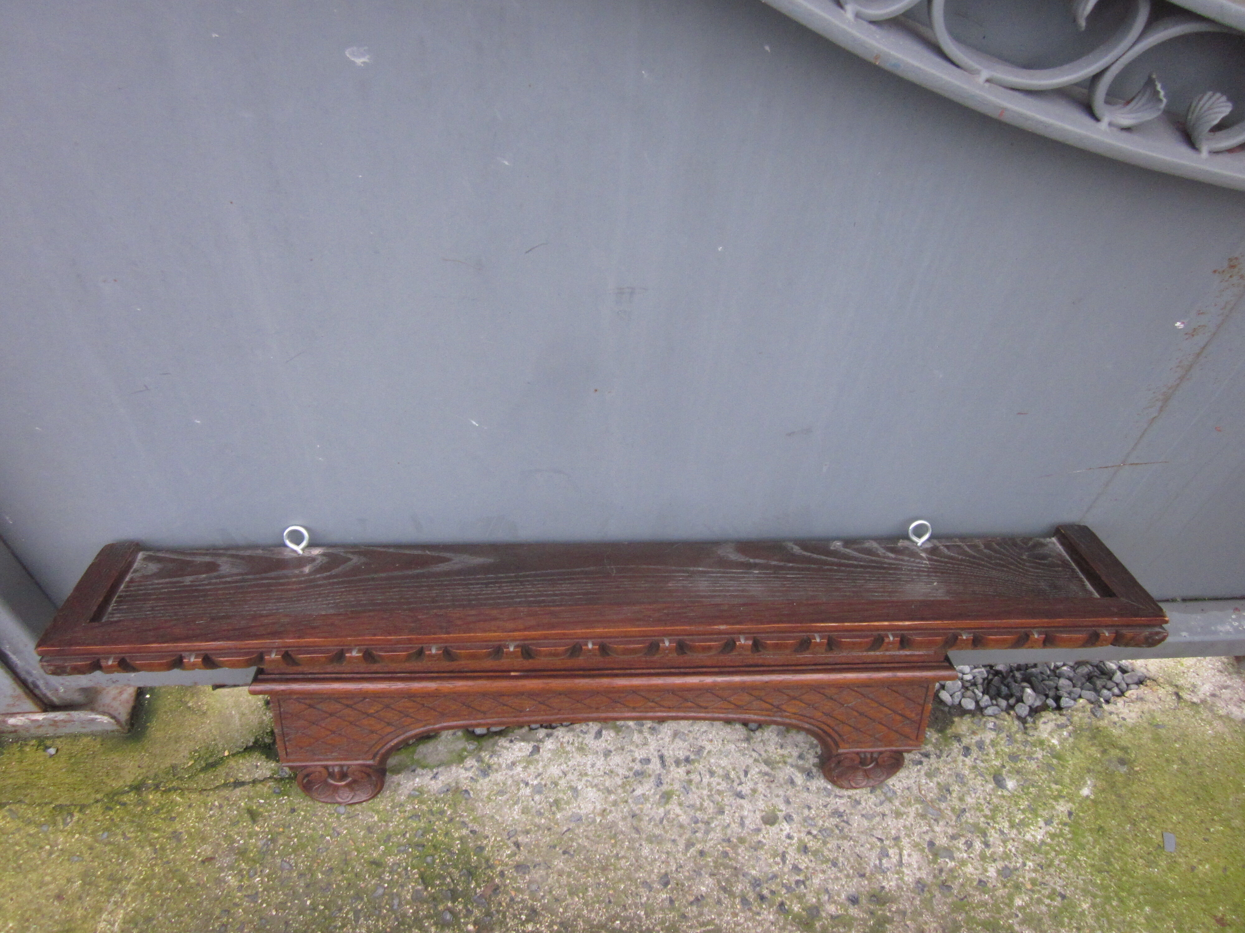 Sculpted channel wall console