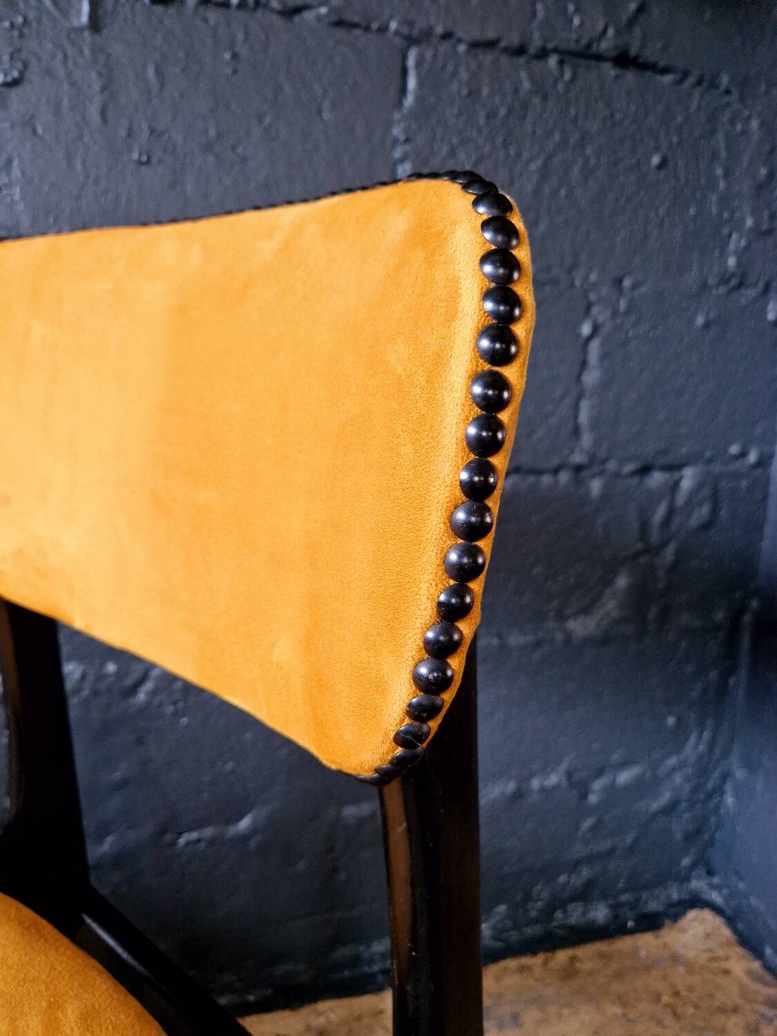 2 vintage chairs in black lacquered wood and yellow/mustard fabric, 1960