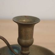 Antique patinated brass hand candlestick – Vintage rat of the cellar