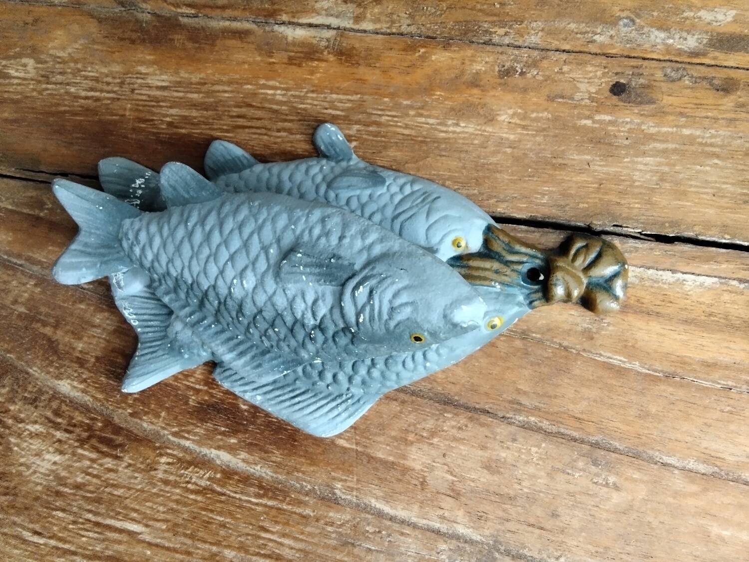 Heurtoir en fonte trio de poissons