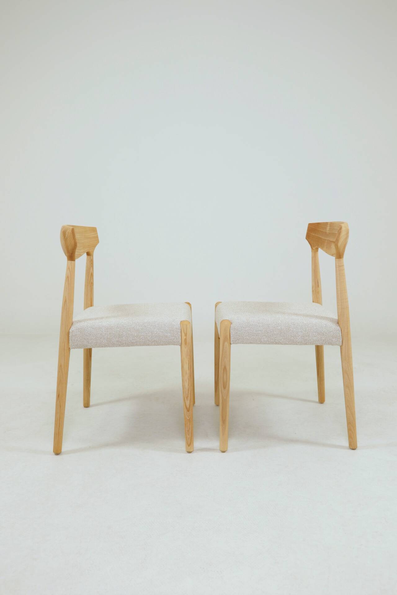 Pair of linen dining chairs