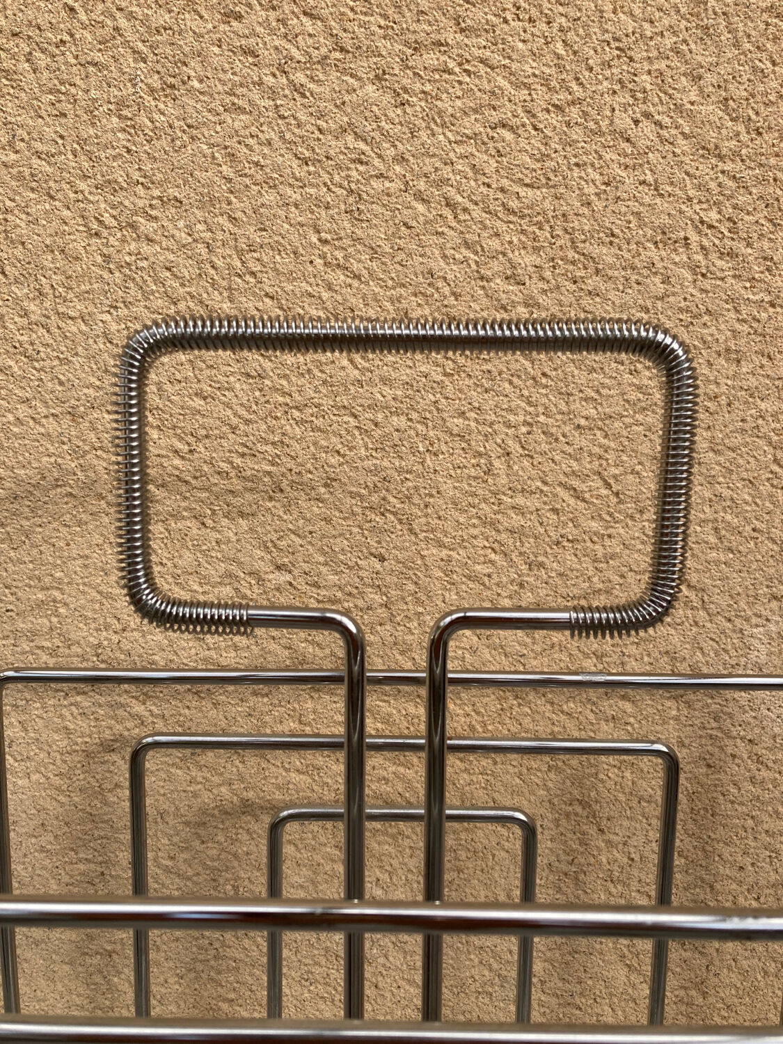 Chrome magazine rack