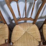 4 rustic farmhouse chairs made of wood and straw
