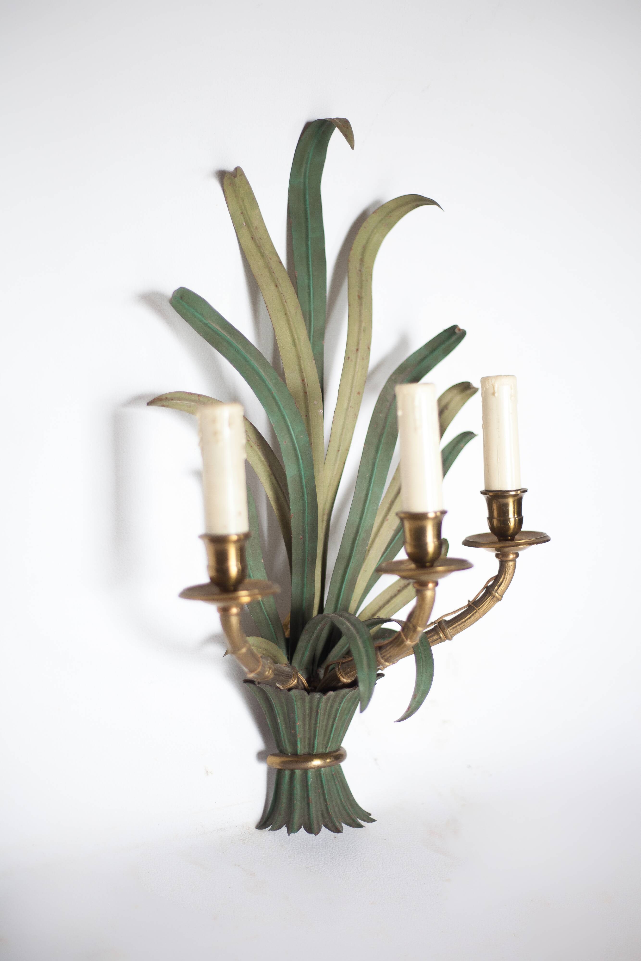 Pair of Maison Baguès wall lights with faux bamboo bronze and metal arms.