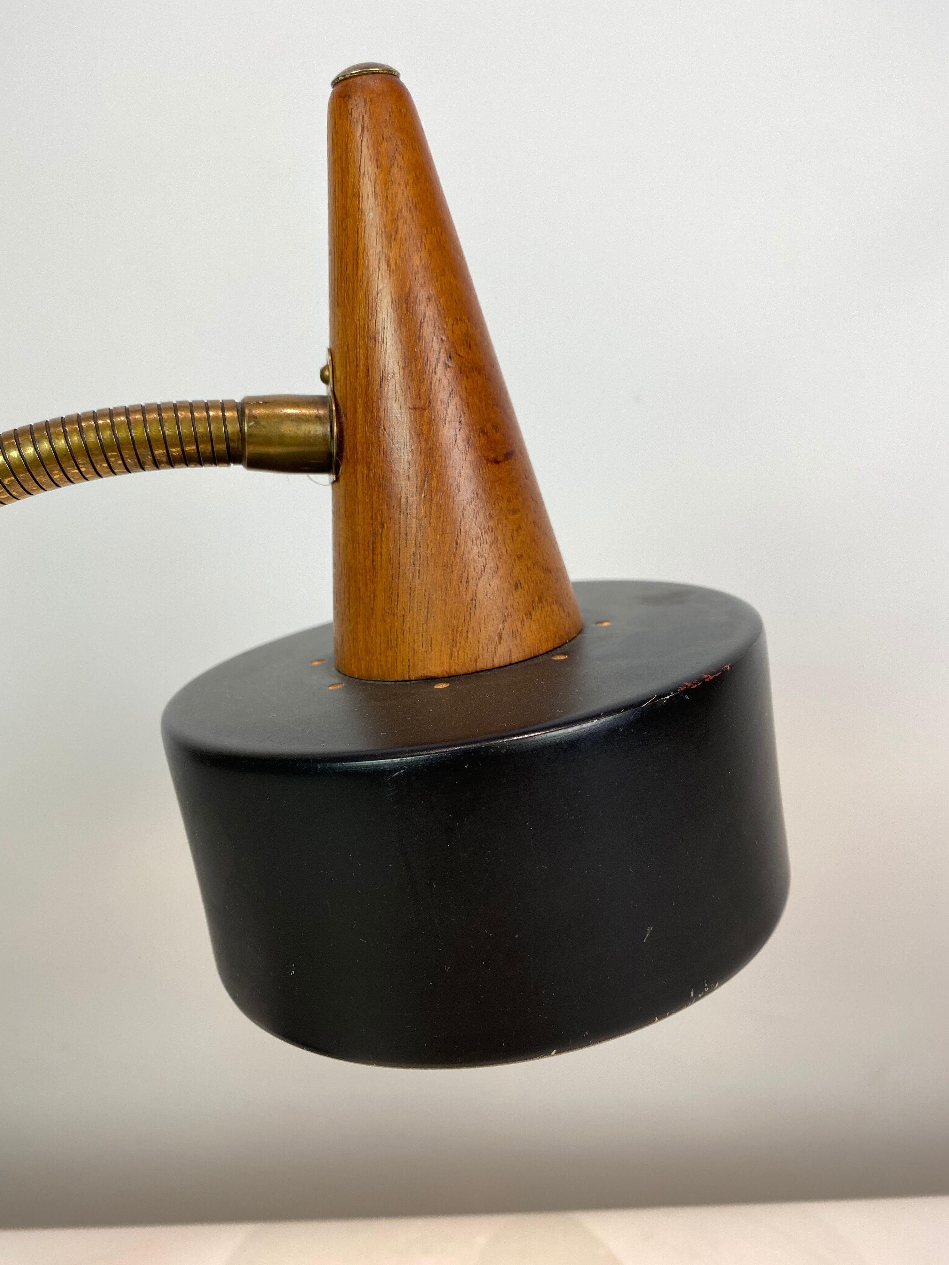 Table lamp of black metal and teak of Danish design, 1960s