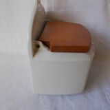 Saltbox in earthenware flowers cover wood