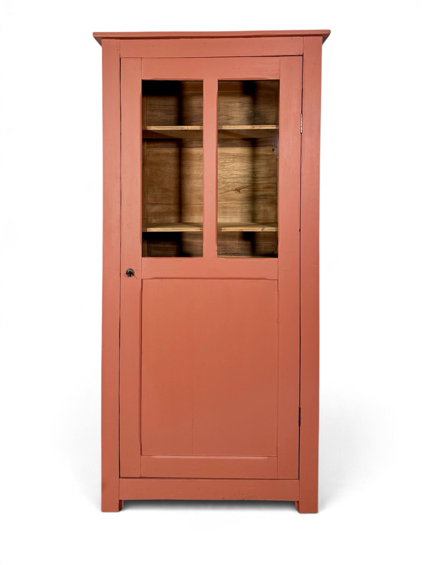 Antique glass-fronted terracotta cupboard