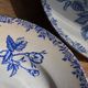 2 flat plates mismatched iron earth with blue flower motifs France