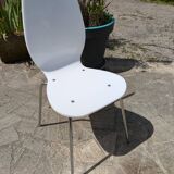 White plexiglass chair