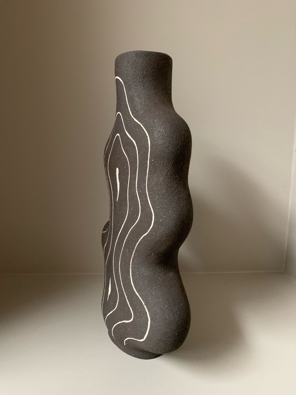 Raw black stoneware vase