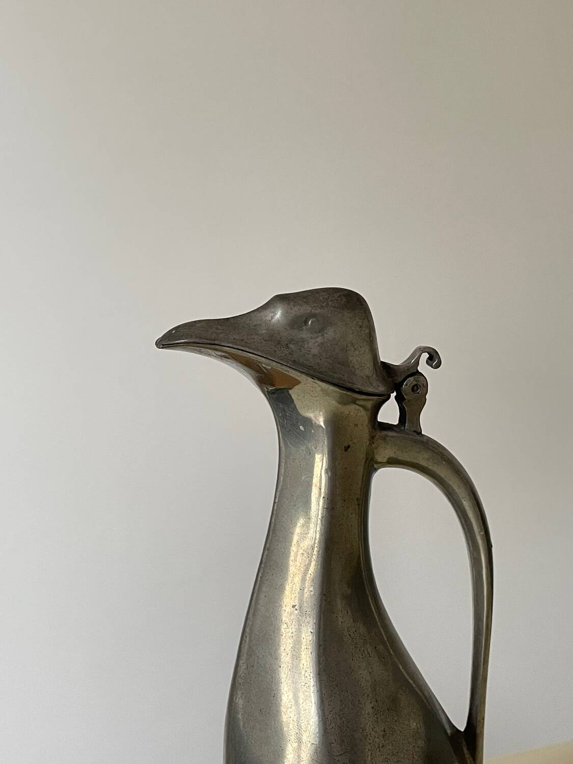 Polished pewter penguin-shaped carafe designed by Hugo Leven for Kayserzinn