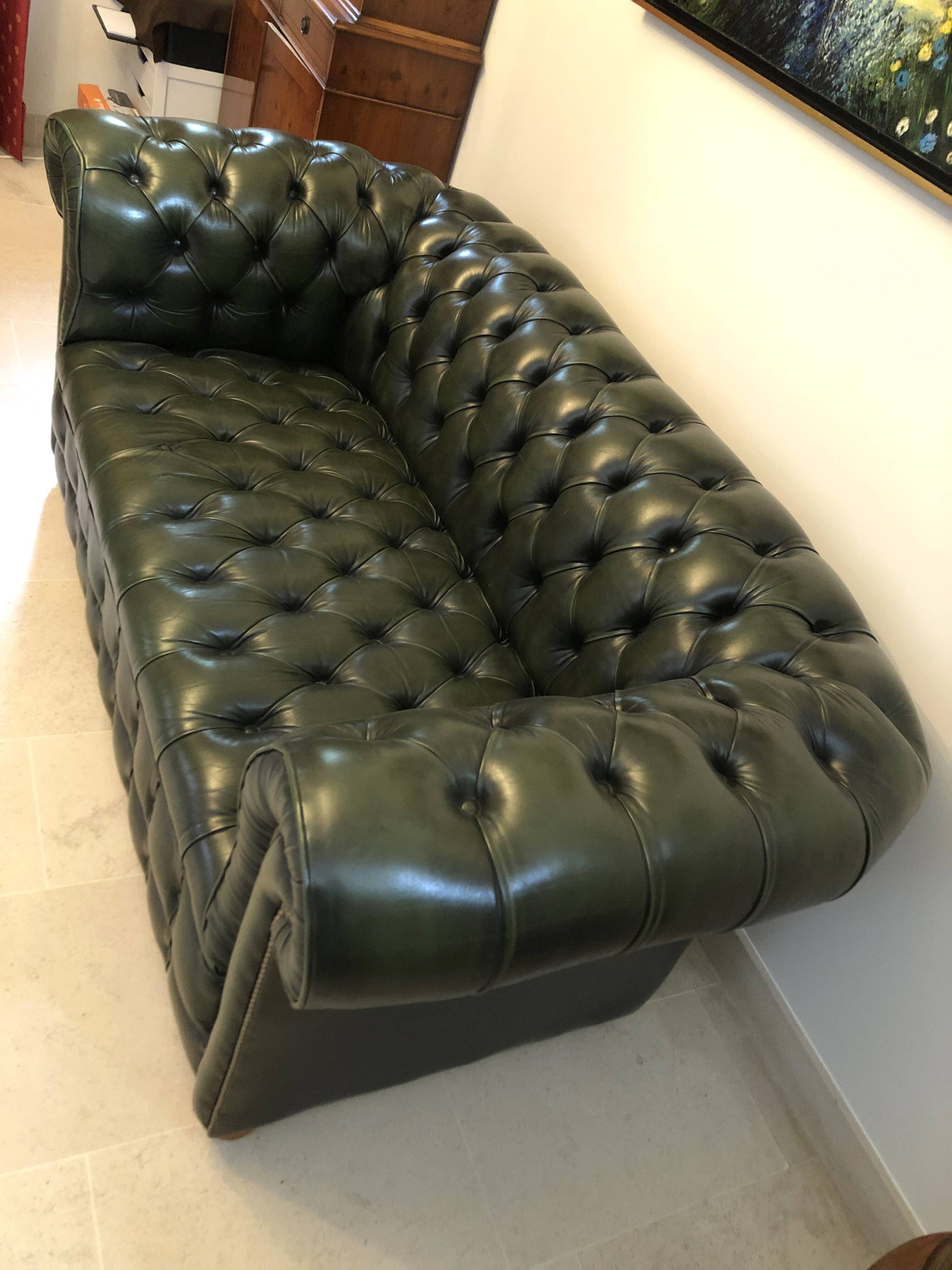 Patinated green English Chesterfield sofa